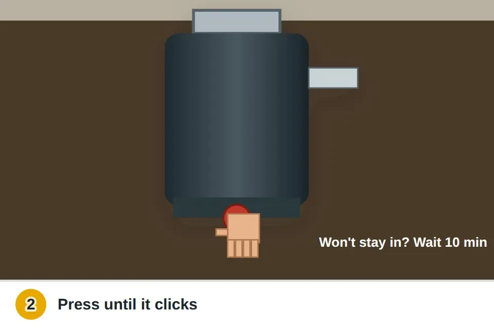 Finger pressing the red reset button on the bottom of a garbage disposal under the sink