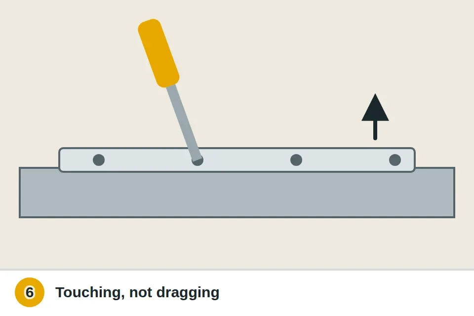 Screwdriver raising the center strip of an adjustable threshold until the sweep touches it
