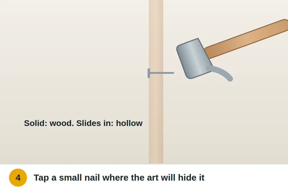 Small finish nail tapped into the wall where the picture will cover it to feel for solid wood