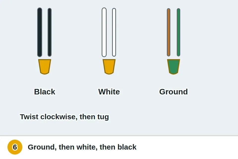 Ground connected first, then white to white and black to black twisted under wire nuts