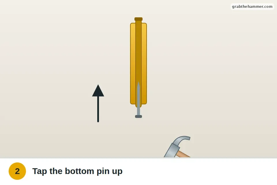 Nail held under the bottom hinge pin and tapped upward with a hammer