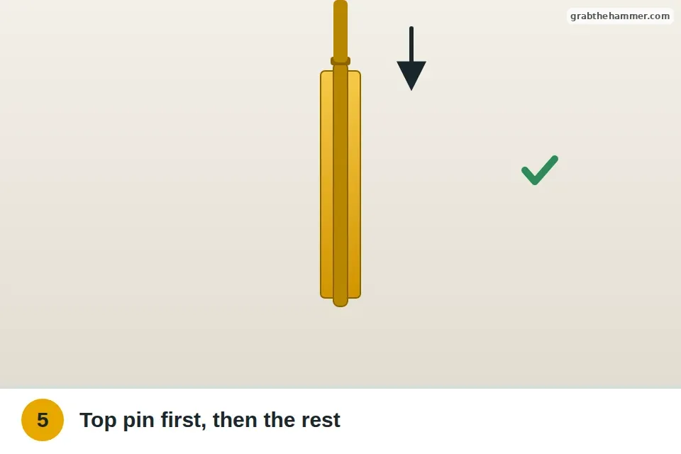 Hinge knuckles lined up and the top pin dropped in first when rehanging the door