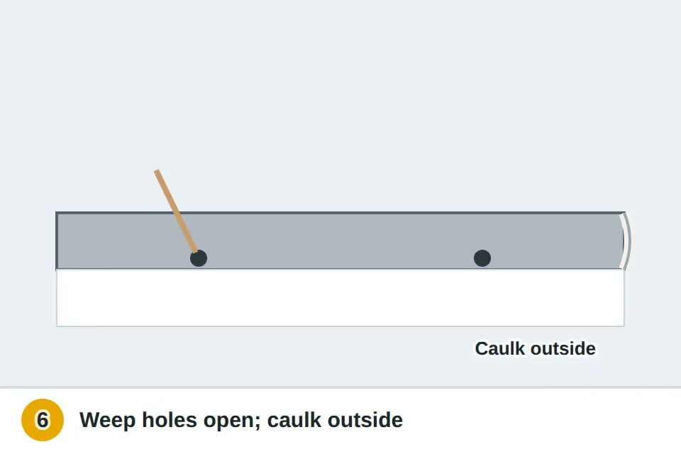 Toothpick clearing a weep hole in a framed shower door track, and a bead of caulk along the outside of the frame where it meets the tub