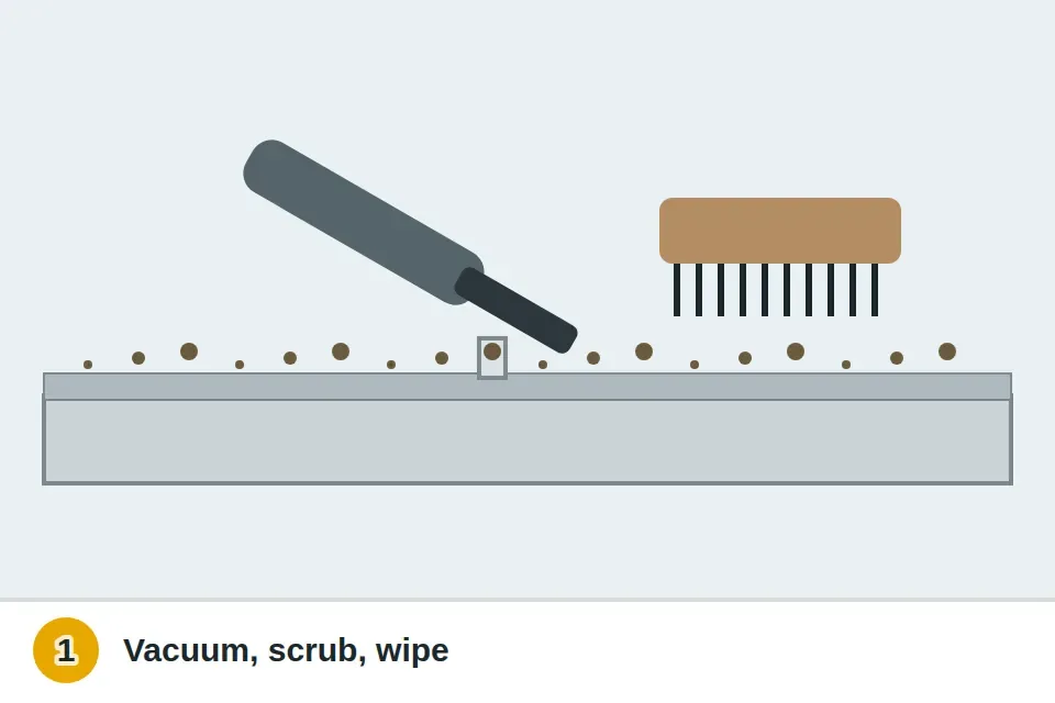 Vacuum crevice tool pulling grit out of a sliding door track, followed by a stiff brush
