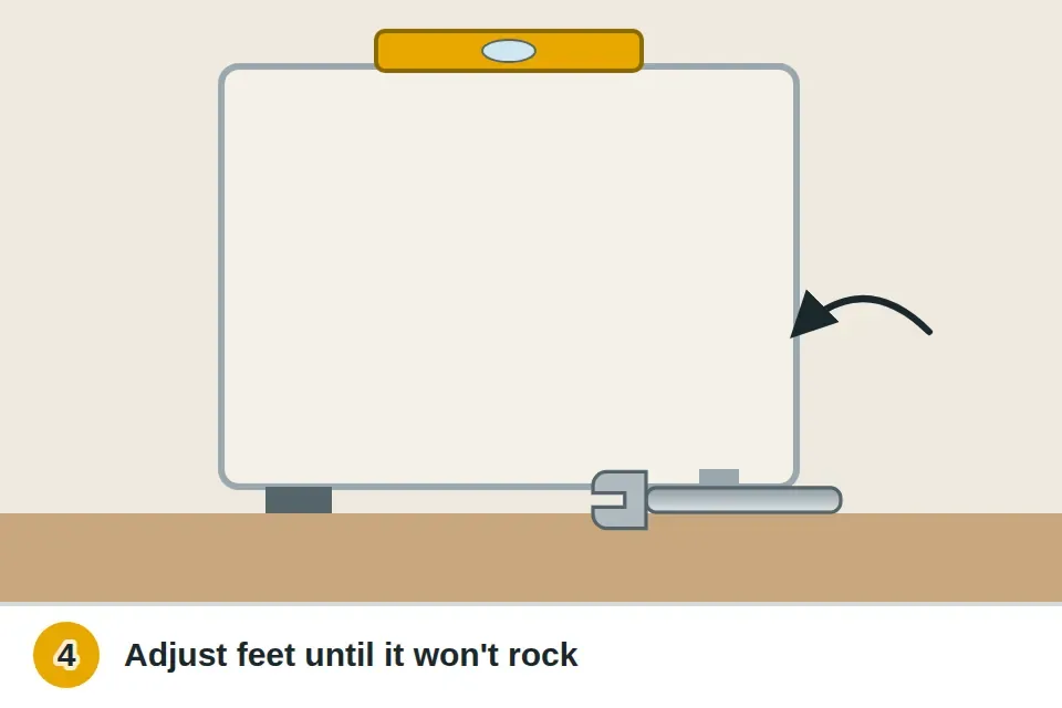 Washer's front leveling foot being screwed down until the machine stops rocking, with a level on top