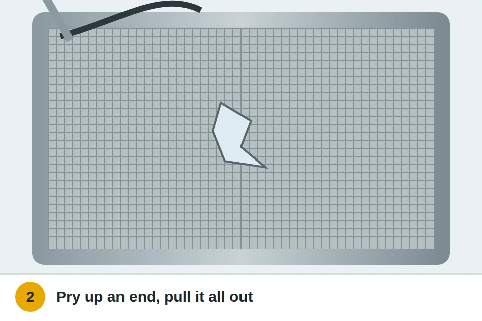Screwdriver prying the rubber spline out of the frame groove